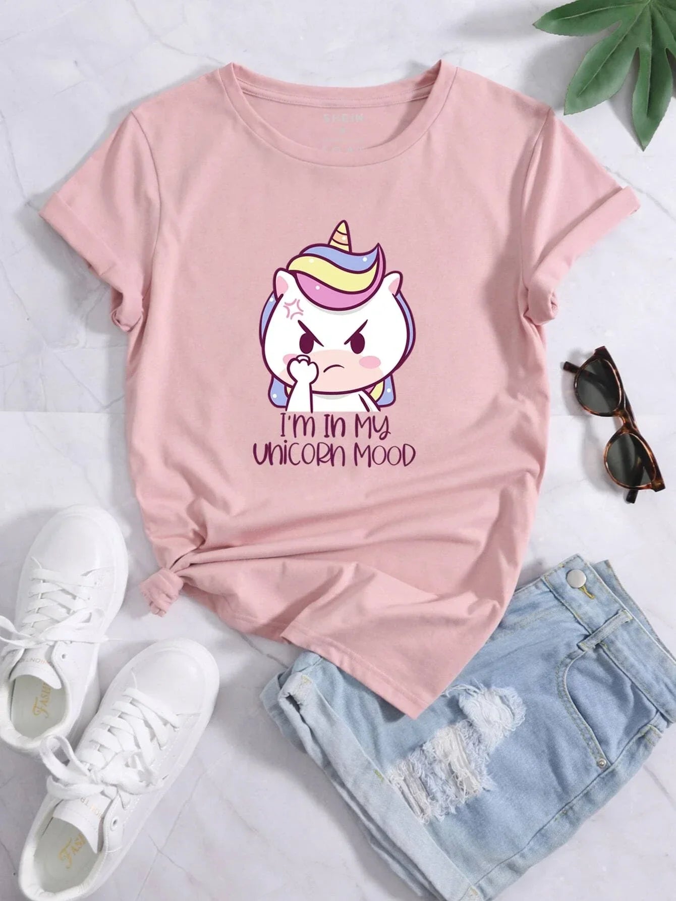 Camiseta feminina com estampa unicórnio nervoso